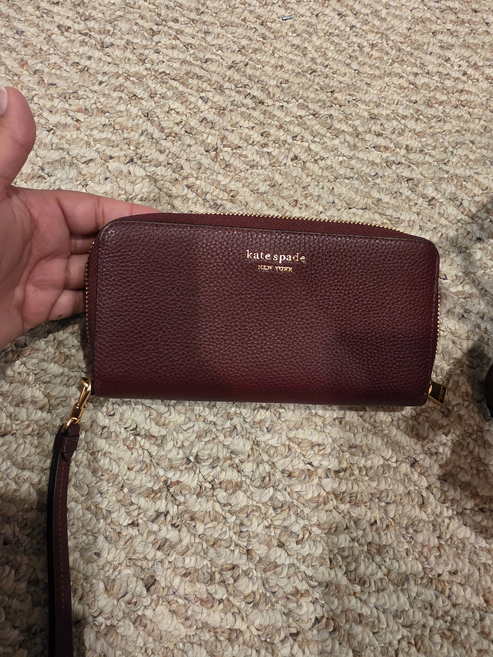 kate spade Maroon Pebbled Leather Zip Wristlet with Gold Hardware